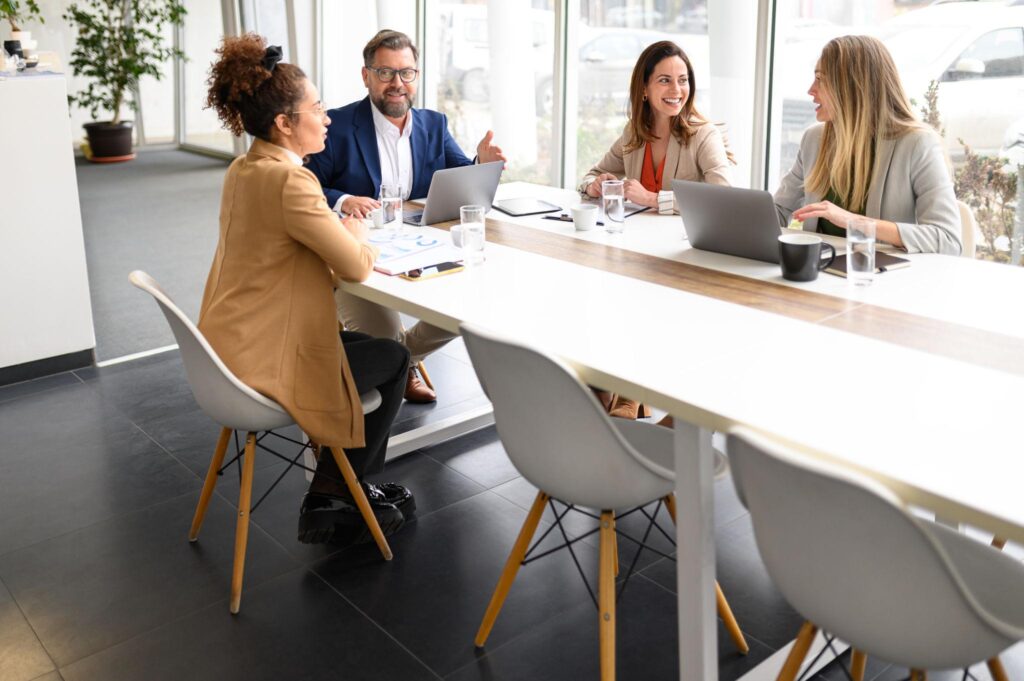 Legal process support professionals discussing workflow solutions for UK law firms